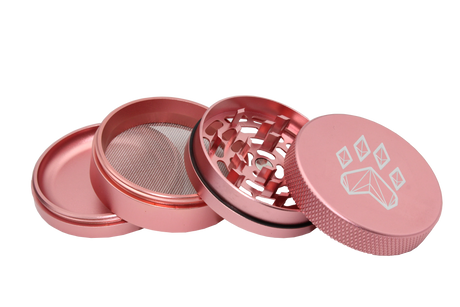 exploded view of the wolf grinders 2.5" 4 piece metal grinder. made of durable aluminum construction and anodized pink finish for a premium feel.