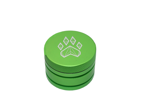side view of the wolf grinders 2.5" 4 piece metal grinder. made of durable aluminum construction and anodized green finish for a premium feel.
