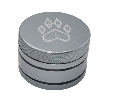 side view of the wolf grinders 2.5" 4 piece metal grinder. made of durable aluminum construction and anodized silver finish for a premium feel.