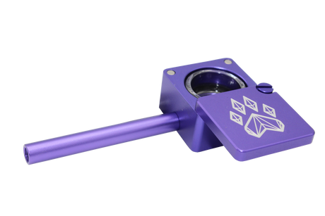 side view of the wolf grinders cannon hand pipe, made of machines aluminum with a swivel cover to carry flower ready. A purple anodized finish that is durable for long term use.