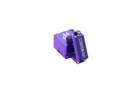 view of the wold grinders scorpion folding hand pipes. made of aircraft grade aluminum with a quartz bowl for performance smoking in a compact package finished in purple. able to be folded for carry and storage.