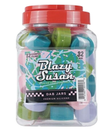 Front view of the Blazy Susan 32mm dab jars in a 52-count retail display tub featuring assorted vibrant colors. These heat-resistant, non-stick silicone containers provide ample space to keep your waxes and concentrates fresh.