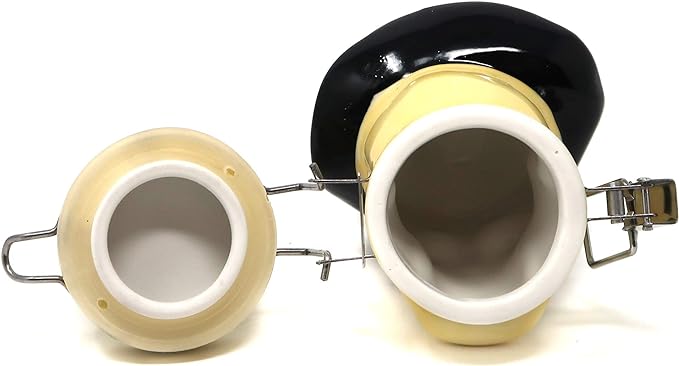 Angled overhead view of the Contained Art ceramic pirate skull stash jar in white with its fitted lid removed. Equipped with a thick silicone o-ring, this 100ml jar creates a highly effective smell-proof seal to lock in moisture and terpenes.