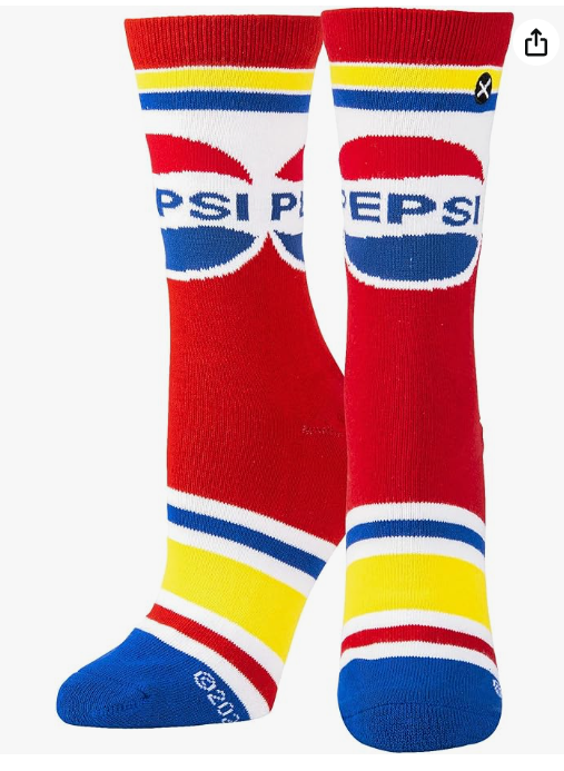 Front view of a pair of Crazy Socks featuring officially licensed Pepsi graphics. These vibrant novelty crew socks showcase the classic red, white, and blue globe brand logo text layered over a royal blue background to add a distinct pop to your outfit.