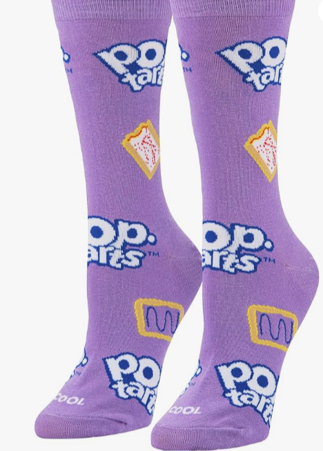 Front view of a pair of Crazy Socks featuring officially licensed Pop-Tarts graphics. These vibrant novelty crew socks showcase floating sprinkles and frosted toaster pastries against a bold blue background to add a playful look to your wardrobe.