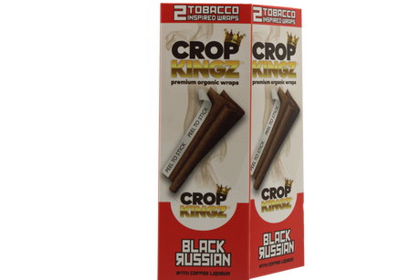 Front angled view of the Crop Kingz Tobacco Inspired Wraps 15-count display box in white and red packaging. Made from 100% organic hemp, these tobacco-free wraps mimic the rich flavors of traditional blunts and feature an innovative self-sealing strip.