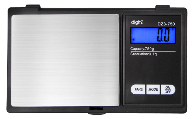 Angled overhead view of the DigiTz DZ3-750 measurement scale in black and silver. This compact 750g pocket scale features a stainless steel platform for accurately measuring larger quantities of herbs, concentrates, and small items on the go.