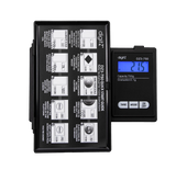 Front angled view of the DigiTz DZ3-750 measurement scale in black with its protective hard cover open. The sturdy lid safeguards the delicate weighing sensor during travel and can function as a makeshift tray for loose materials.