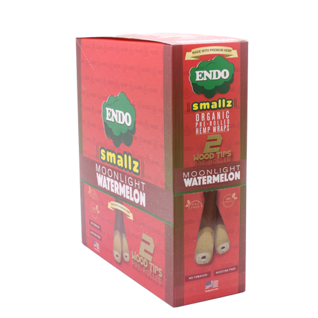 Front view of the Endo Smallz 15-count display box in Moonlight Watermelon featuring bright green and red colors. These compact funnels are constructed from unadulterated German hemp and capable of holding exactly one gram of ground material.