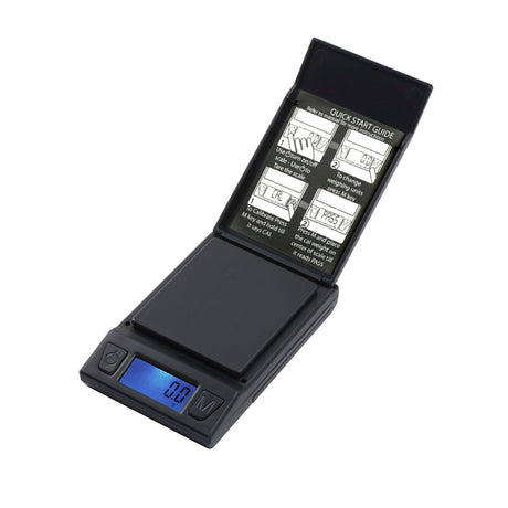 Front angled view of the Fast Weigh TR750 Measurement Scale in matte black and silver. This reliable, compact digital pocket scale features a large 750g capacity to accurately weigh loose botanical herbs and solid concentrates.