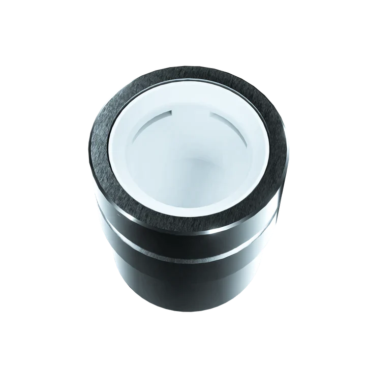 Top-down angled view into the Focus V Carta 2 Intelli-Core Wax Atomizer chamber in silver and white. The spacious quartz-coated ceramic bucket provides even heat distribution to maximize the flavor and vapor production of your extracts.