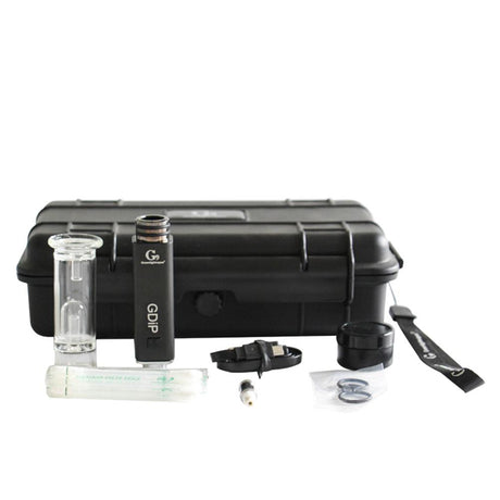 Angled overhead view of the complete G9 Greenlightvapes G-Dip vaporizer kit inside its elegant plastic travel case. This comprehensive dab set includes the device body, two vapor tips, glass bubbler, cleaning swab, silicone container, and a micro-USB charging cable.