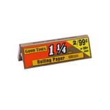 Angled overhead view of the open Good Times rolling papers display box showing the individual red booklets. These traditional papers deliver a dependable, steady combustion rate without introducing harsh chemical tastes.