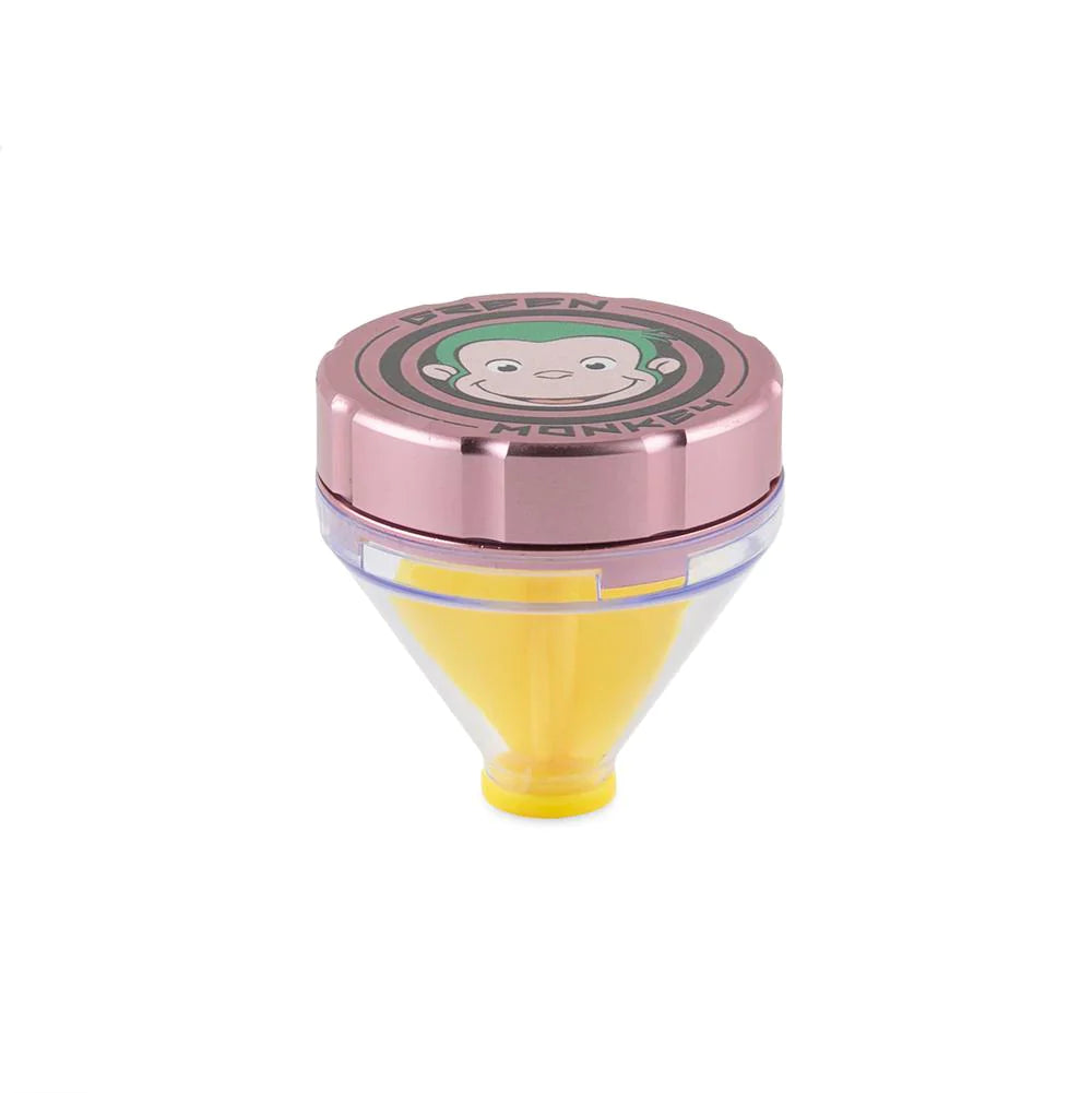 Front profile view of the Green Monkey Patas 50mm funnel grinder in sleek matte pink. This innovative metal herb grinder features a built-in dispensing funnel for completely mess-free loading of your cones and glass bowls.