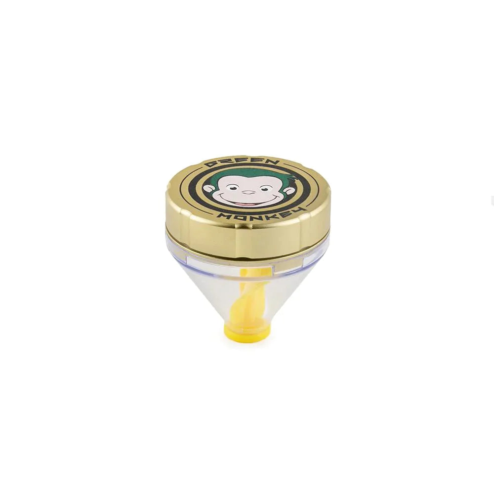 Front profile view of the Green Monkey Patas 50mm funnel grinder in sleek matte gold. This innovative metal herb grinder features a built-in dispensing funnel for completely mess-free loading of your cones and glass bowls.