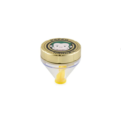 Front profile view of the Green Monkey Patas 50mm funnel grinder in sleek matte gold. This innovative metal herb grinder features a built-in dispensing funnel for completely mess-free loading of your cones and glass bowls.