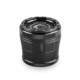 Front profile view of the Green Monkey Tamarin 50mm grinder in metallic black. This premium 4-piece aluminum herb grinder features a strong magnetic lid for secure, effortless shredding of your favorite dry herbs.
