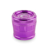 Front profile view of the Green Monkey Tamarin 50mm grinder in metallic purple. This premium 4-piece aluminum herb grinder features a strong magnetic lid for secure, effortless shredding of your favorite dry herbs.