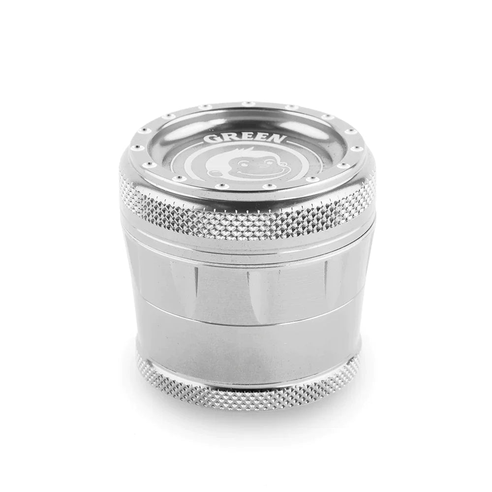 Front profile view of the Green Monkey Tamarin 50mm grinder in metallic silver. This premium 4-piece aluminum herb grinder features a strong magnetic lid for secure, effortless shredding of your favorite dry herbs.