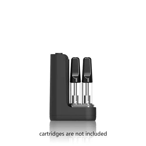 Close-up top down view of the Hamilton Devices Tombstone battery showcasing two standard glass oil cartridges securely inserted. The ergonomic, auto-draw activated device fully conceals your delicate glass attachments to protect them from accidental drops and damage.