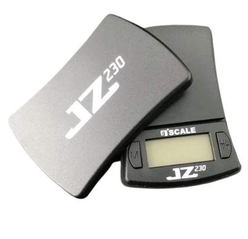 Angled overhead view of the Jennings JZ230 scale in black and silver, shown open. This pocket-sized digital scale features a protective cover that doubles as an expansion tray for accurately measuring dry herbs and concentrates.