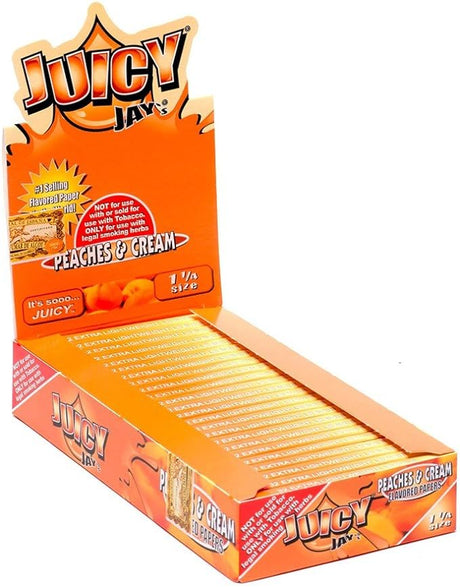 Front view of the Juicy Jay's pure rolling papers 1 1/4 size 24-pack display box in a vibrant, multi-colored aesthetic. This wholesale countertop display features a sweet variety of triple-dipped hemp papers designed to enhance your dry herb smoking sessions.