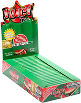 Front view of the Juicy Jay's pure rolling papers 1 1/4 size 24-pack display box in a vibrant, multi-colored aesthetic. This wholesale countertop display features a sweet variety of triple-dipped hemp papers designed to enhance your dry herb smoking sessions.