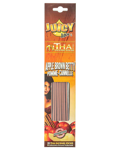 Front view of the Juicy Jay's Thai Incense Sticks 12-pack display in Apple Brown Betty flavor. This folding retail carton contains twelve sleeves of highly concentrated, slow-burning incense designed to effectively manage ambient odors.