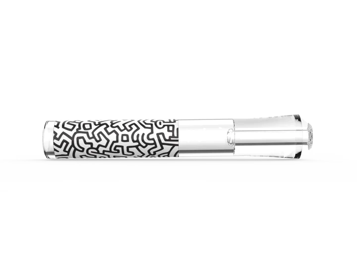 Front view of the K.Haring glass taster pipe in a black and white colorway. This premium borosilicate glass one-hitter features officially licensed Keith Haring artwork for a highly stylish, travel-ready dry herb session.