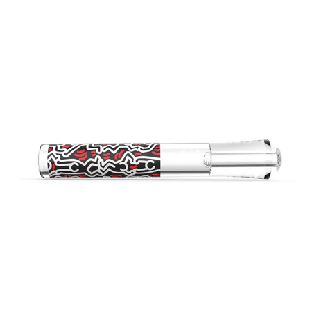 Angled overhead view of the K.Haring black and white glass taster focusing on the deep packing bowl and built-in ash catcher pinch. This ergonomic glass construction provides incredibly smooth, flavorful draws while actively keeping unwanted debris out of the mouthpiece.