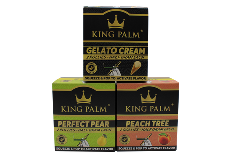 front view of the King Palm Flavored Rollies in an assortment of vibrant 20-count display boxes. Holding 0.5 grams of dry herb each, these tobacco-free natural leaf cones feature a squeeze-and-pop flavor bead in the filter for a customized smoke.