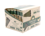 Angled overhead view of the open King Palm mini display box. The black and green wholesale carton houses fifteen individual foil pouches precisely formatted for rapid retail turnover.