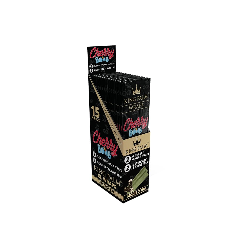 Front angled view of the King Palm XL Wraps 15-count display box in black and gold packaging. Made from natural Cordia leaves, this retail-ready box holds pre-rolled XL wraps designed for massive, tobacco-free smoking sessions.