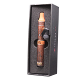Top down overhead view of the complete Kingpin e-Rillo electronic cigarillo kit in brown and gold accents. This wholesale setup includes the pen battery, specialized atomizer chamber, cleaning brush, and a custom wireless USB charger for convenient power ups.