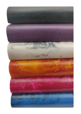 Front view of the Marble and Acrylic dugouts in assorted multi-color swirls. This pocket-sized travel accessory features a built-in storage compartment for dry herbs and a spring-loaded one-hitter bat for discreet sessions on the go.
