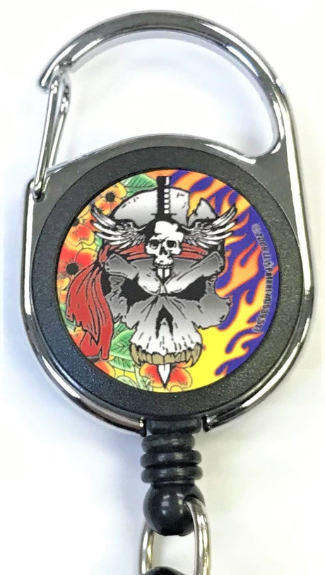 Front facing view of the Merchants Lighter Leash Tattoo Series Holder displaying a skull with knife and flames. This highly practical retail companion accessory clips securely to belt loops, keys, or pockets to ensure consumers never lose their lighter.