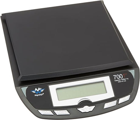 Angled overhead view of the My Weigh 7001DX scale in black. This mid-sized, steel-reinforced ABS plastic scale features a 7000g capacity for versatile kitchen, office, or shipping use.