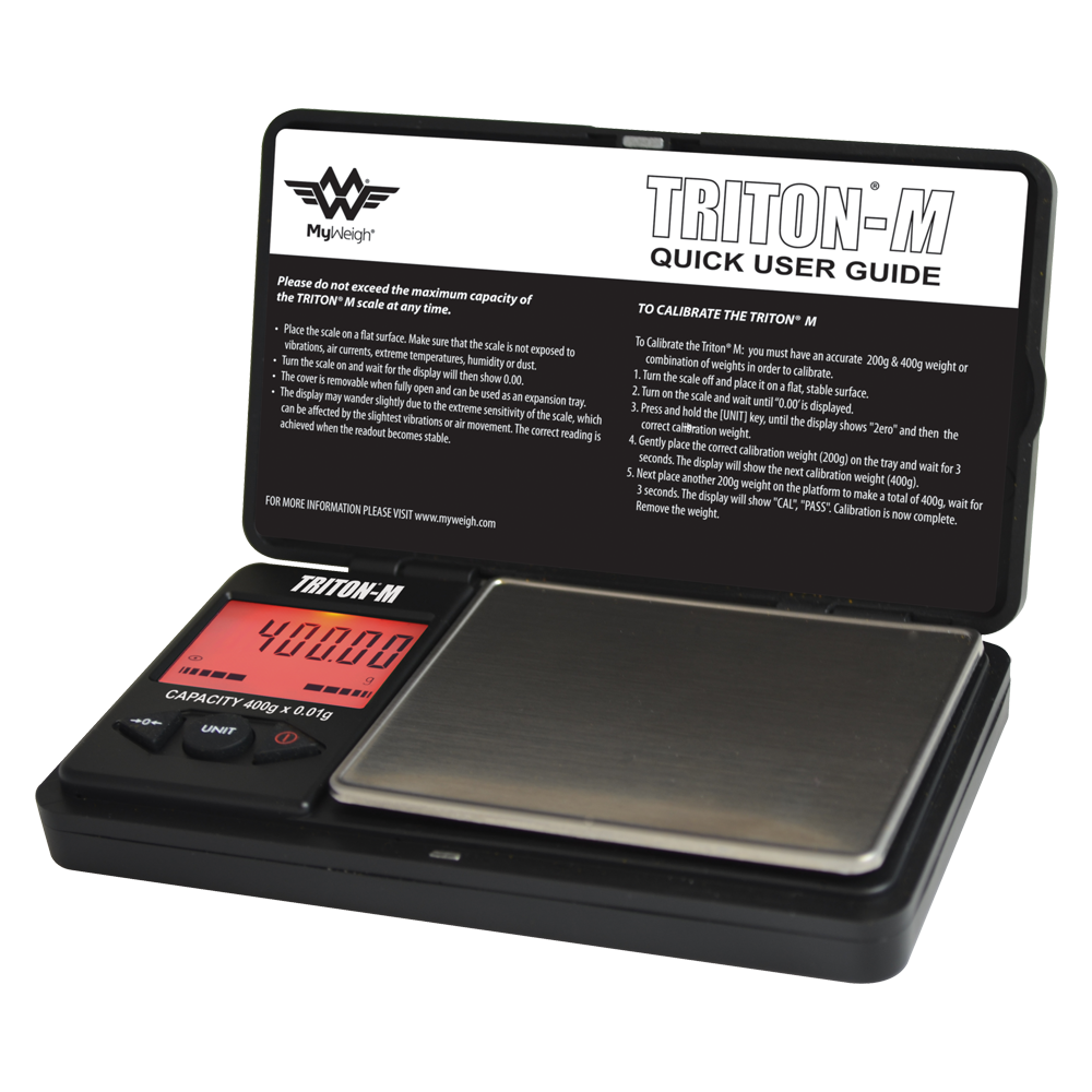 Angled overhead view of the My Weigh Triton T2 digital mini scale in black. This compact 400g x 0.01g pocket scale features a durable ribbed outer casing for precise, everyday weighing of herbs, concentrates, and small jewelry.