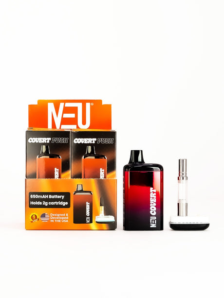 Front facing view of the NEU Push Covert Discreet Battery in reflective black and red. This stealthy 650mAh concealed cartridge battery completely hides your 510-threaded oil tanks within its chassis for ultimate privacy on the go.