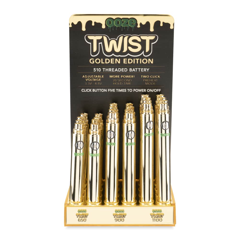 Front view of the Ooze 510 battery 24-count retail display filled with gold metallic vape batteries. This retail-ready wholesale acrylic display provides smoke shops with a highly popular, luxurious setup perfect for checkout counters.