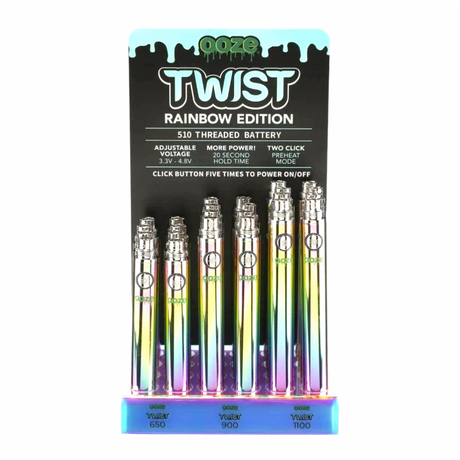 Front view of the Ooze 510 battery 24-count retail display filled with rainbow metallic vape batteries. This retail-ready wholesale acrylic display provides smoke shops with a highly popular, eye-catching setup perfect for checkout counters.