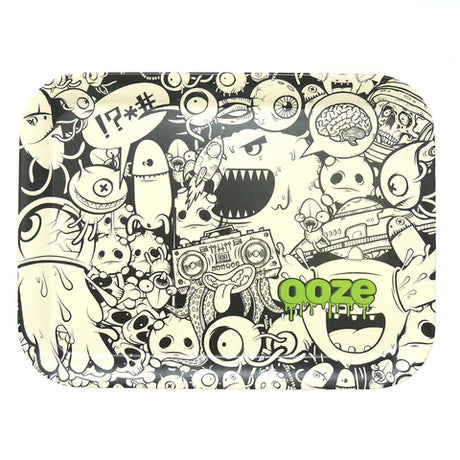 Front view of the Ooze Biodegradable Monsterous medium rolling tray featuring a bright, multi-colored cartoon monster collage over a smooth surface. This eco-friendly tray provides a spacious, flat area to break down dry herbs and roll custom papers.
