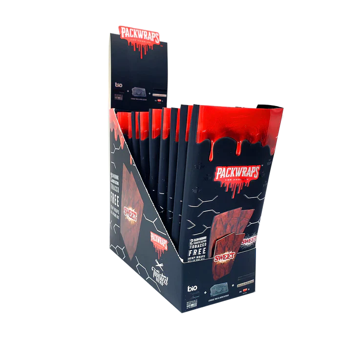 Front angled view of the Packwraps Twisted Hemp Wraps 10-count display box in blak and red packaging. Produced in collaboration with Packwoods, these tobacco-free, slow-burning hemp wraps include a reusable glass tip and a Pro Packer XL tool for a premium rolling experience.