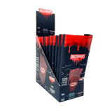 Front angled view of the Packwraps Twisted Hemp Wraps 10-count display box in blak and red packaging. Produced in collaboration with Packwoods, these tobacco-free, slow-burning hemp wraps include a reusable glass tip and a Pro Packer XL tool for a premium rolling experience.