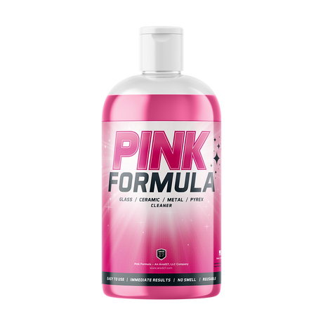 Front view of the Pink Formula 16oz Glass Liquid Wash bottle in clear plastic showcasing the bright pink liquid and matching pink and white label. This fast-acting cleaning solution is formulated to easily cut through stubborn resin and residue on your favorite glass and quartz pieces.