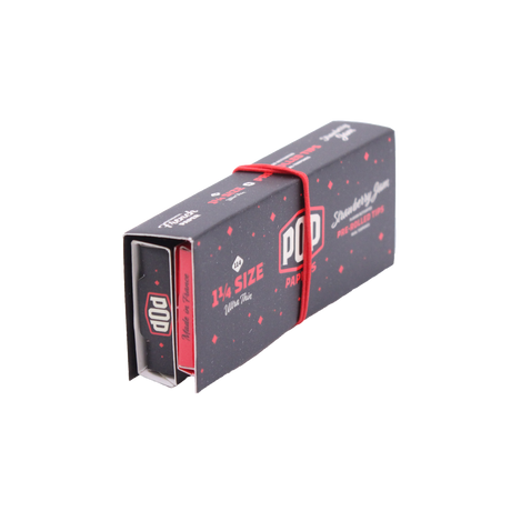 Angled overhead view of the red POP Papers Strawberry Jam booklet opened up to reveal the included rolling materials. It features an integrated extract bead inside the filter that releases a wave of fruit-derived taste.