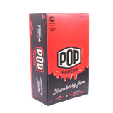 Angled view of the POP Papers Strawberry Jam rolling papers display in bright red. Each pack includes 32 king size leaves and 12 interactive squeeze-and-pop flavor tips.