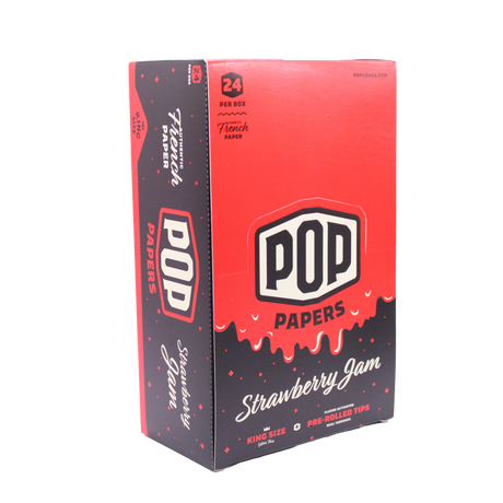 Angled view of the POP Papers Strawberry Jam rolling papers display in bright red. Each pack includes 32 king size leaves and 12 interactive squeeze-and-pop flavor tips.