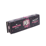 Angled overhead view of the pink POP Papers Super Sweet booklet. The crushable filter beads are filled with fruit-derived terpenes for customized taste.