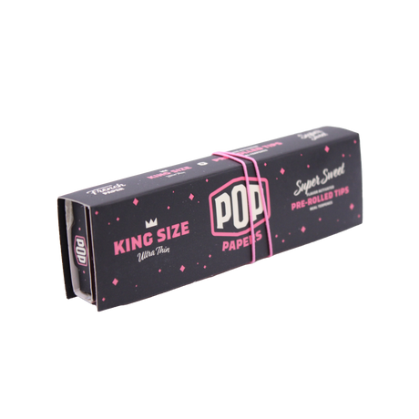 Angled overhead view of the pink POP Papers Super Sweet booklet. The crushable filter beads are filled with fruit-derived terpenes for customized taste.